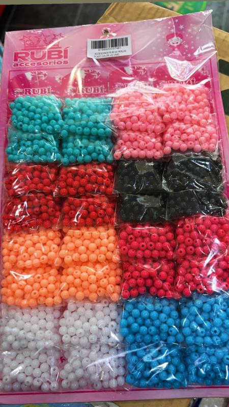 Imagen ilustrativa de ACCESORIOS RUBI 84 PERLAS PLAST. COLOR x32 UNID